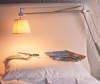 Decorate the bed area with the Archimoon lamp by Flos - 100% made in Italy